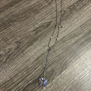 Harley Davidson necklace with emblem, and an extended chain with angel wings!